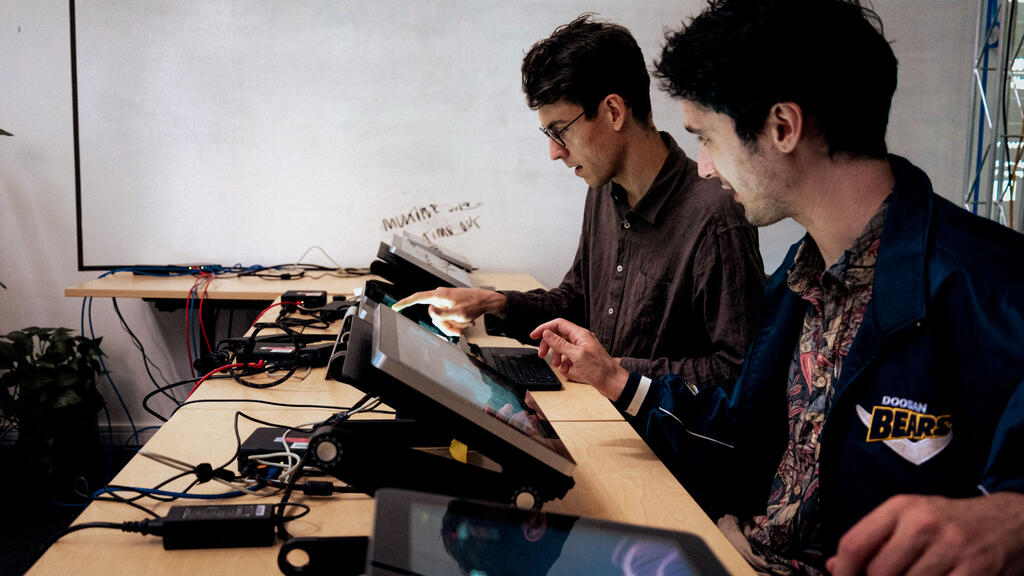 Julien & Andy working on a project