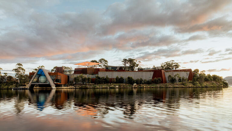 Photo of the Museum of Old and New Art as seen from the water. 