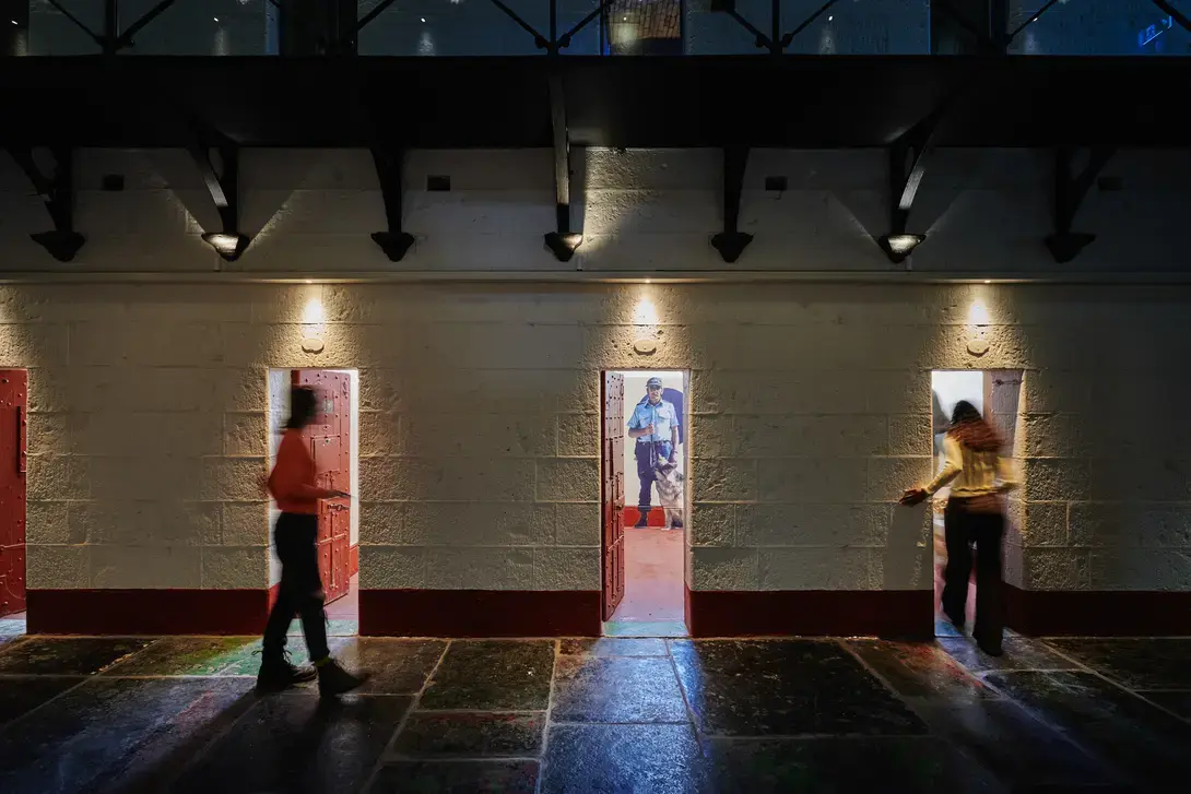 Visitors entering the cells during a visit a Pentridge Prison tour 