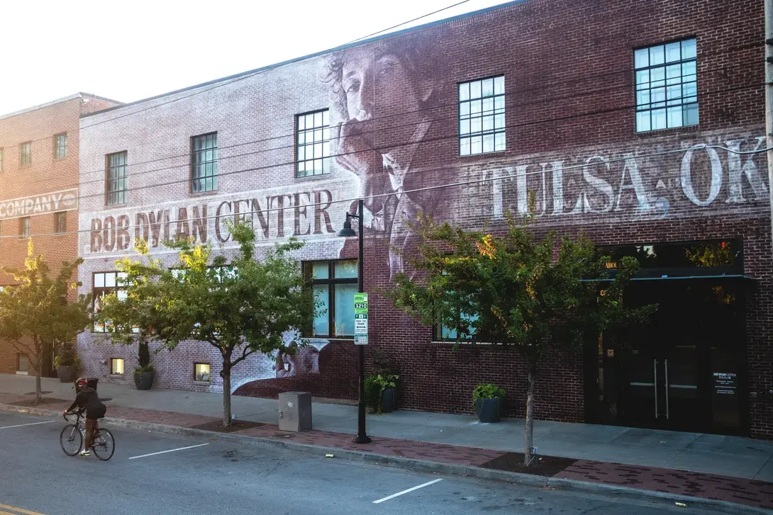Photo of a mural on the exterior of the Bob Dylan Center